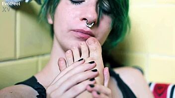 Brett Rossi plays with strap-on dildo.