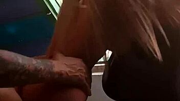 Blonde uses sex toy outdoors in lingerie adventure.