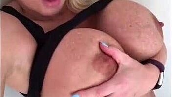 sophie james enjoys private moments at home. solo milf in stockings.