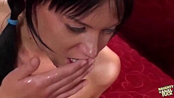 suburb girl with pigtails led inside for doggy on red couch