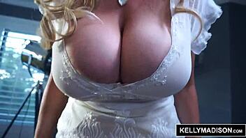 Kelly Madison teases in chiffon with big natural tits for wild titty action.