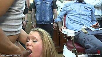 Public display of bondage and discipline with a blonde adult film star