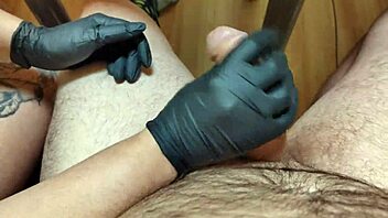 man, black oiled gloves working magic for intense pleasure!