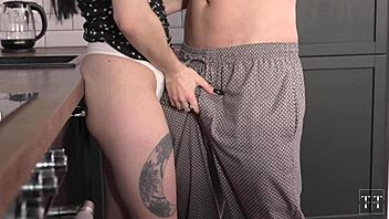 hot brunette scores a quick creampie in kitchen