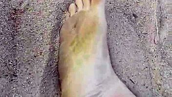 Love those bare feet in sand for foot fetish fun