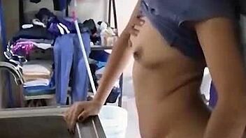 Beautiful Mexican girl washing dishes caught intimately