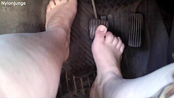 Zeraphine73 shows off her chubby feet in socks while parked outdoors with a friend.