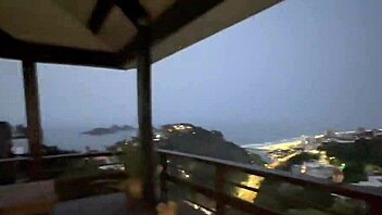 skinny stepdaughter with stepfather on balcony outdoors