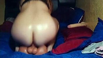 Colombian babe with big ass rides huge 10-inch toy. Her curves bounce wild with every thrust.