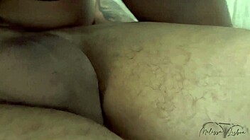 Blindfolded, she submits her big ass to two monster cocks.