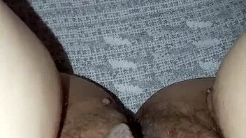 This milf has a tight and hairy pussy.