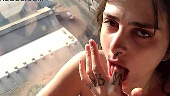 Brunette Slut Teases In Sheer Red Swallowing Cum