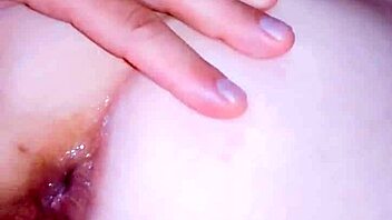 Hot brunette in stockings feels intense pleasure fondling her sexy body