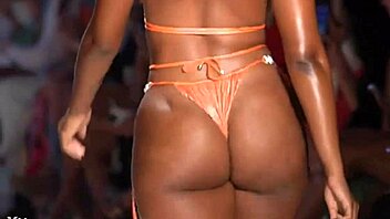 admire the ebony model's curvy figure and big ass