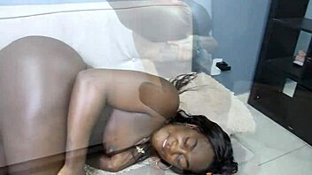 Tattooed guy gets a workout from chocolate.