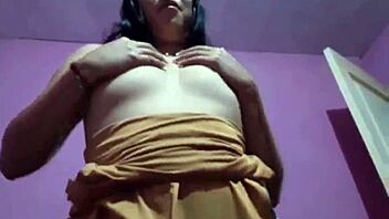 beautiful latina dances to favorite music while touching herself