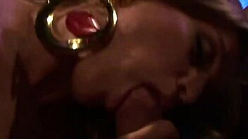Myla Charles and Rita Faltoyano suck and get fucked doggystyle in a car outdoors.