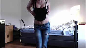 A girl is having a lot of fun while stripping and giving blowjobs