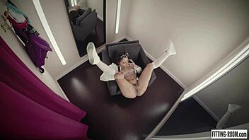 trying on clothes in the fitting room with erotic touches