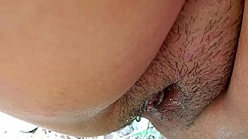 Girl made a pissing in the jungle, reminiscent of village scenes