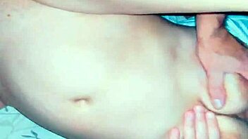 Hot brunette in stockings feels intense pleasure fondling her sexy body