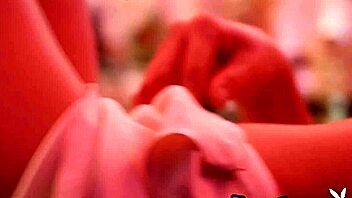 Blonde teen Amelia poses on the bar counter