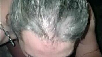 Female slave gives blowjob at gloryhole, swallows cum 😈