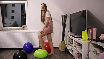 girl pops balloons in pantyhose and stockings