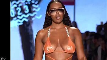 admire the ebony model's curvy figure and big ass