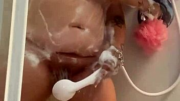 wet shower play turns into intense masturbation and cum on small tits