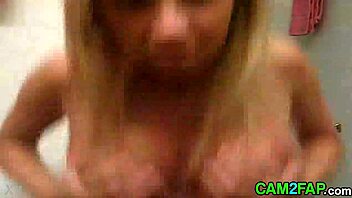 hey, check out this blonde teen flashing her huge tits on webcam