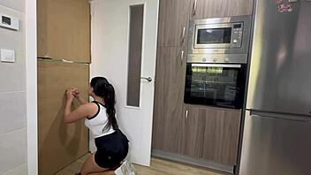 Latina finds cock in kitchen glory hole to suck