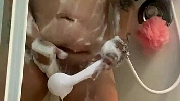 wet shower play turns into intense masturbation and cum on small tits