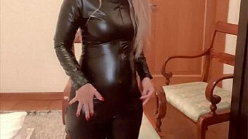 Oiled Belly Dancer Teases in Latex Catsuit for Findom Goaldigger’s PD Song