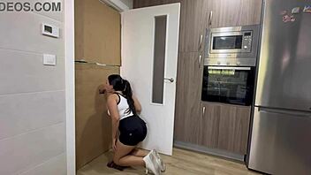 Latina finds cock in kitchen glory hole to suck