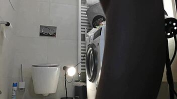 Tattooed petite alia strips in bathroom showing tight shaved pussy and bare ass