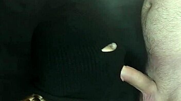 my step sister's hot mouth sucks my cock while her face is hidden by a balaclava. she moans during the sloppy blowjob.