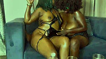 Two girls are having an experience on the couch with two guys