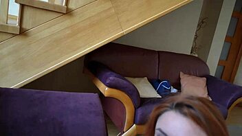 Beautiful redhead sucks cock moaning