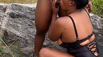 A pornstar gets fucked in the bush by a black guy