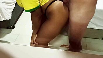 latina wife has fun with lover while husband watches football