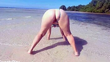 chubby milf with big fat ass pisses openly on beach