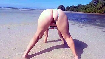 chubby milf with big fat ass pisses openly on beach