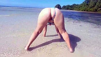 chubby milf with big fat ass pisses openly on beach
