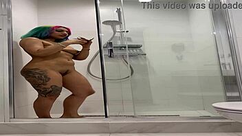 Why is naked Roxy masturbating in the shower?