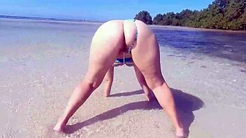 chubby milf with big fat ass pisses openly on beach