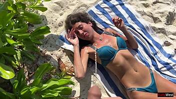 Pissed on Skinny Babe at Public Beach in Shock