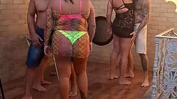 milf with big ass sits on tattooed guy's cock