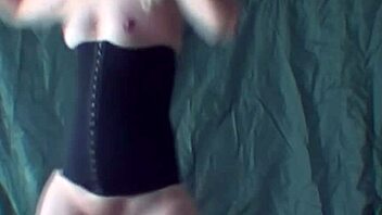 Blonde performs striptease while dancing