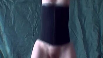 Blonde performs striptease while dancing